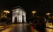 Police provide security at the Arc de Triomphe in Place Charles de Gaulle at night in Pari...