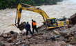 Rescuers work at the landslide site in Taining County, southeast China's Fujian Province,...