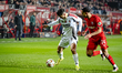 Besiktas JK midfielder Milot Rashica and FC Twente defender Anass Salah-Eddine play during...