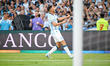 Adrian Martinez, of Racing Club, celebrates the first goal of his team against Belgrano de...