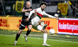 FC Eindhoven forward Evan Rottier and ADO Den Haag defender Diogo Tomas play during the ma...