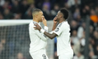 Kylian Mbappe centre-forward of Real Madrid and France celebrates with Vinicius Junior lef...
