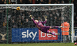 Goalkeeper Franco Ravizzoli of Wycombe Wanderers saves halfway through the second half dur...
