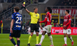 Daniele Chiffi, the referee, shows the yellow card during the match between AC Milan and F...