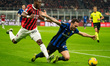 Hakan Calhanoglu (FC Inter) and Yunus Musah (AC Milan) participate in the Italian champion...