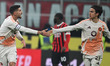 Lorenzo Pellegrini and Paulo Dybala of AS Roma celebrate after a goal during the Coppa Ita...