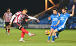 Artell Jude Boyd (2 Cheltenham Town) shoots during the EFL Trophy Quarter Final match betw...