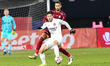Sergiu Bus and Leonardo Da Costa Bolgado are in action during the match between CFR 1907 C...