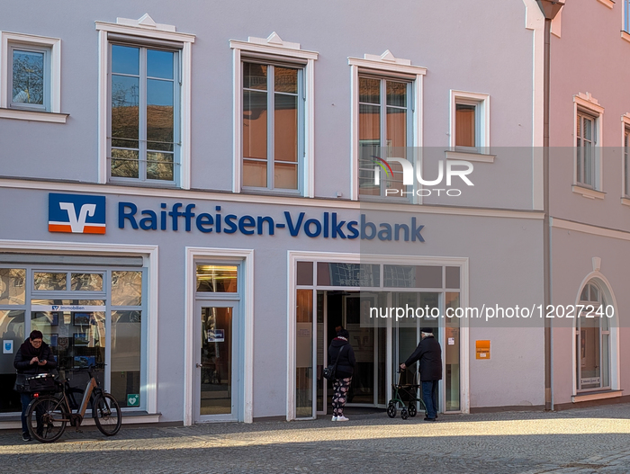 Senior Citizen With Walker Entering A Bank