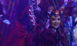 An Indonesian performer dances down the street during the Chingay Parade, themed 'JOY,' at...