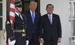 US President Donald Trump greets the Prime Minister of Japan, Ishiba Shigeru, before holdi...