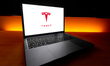 The Tesla logo, representing the American multinational automotive and clean energy compan...