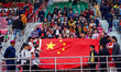 The audience hoots for the team in the China-Nepal Friendship Football Match at Dasrath St...