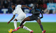 Andre Anguissa of SSC Napoli competes for the ball with Nuno Albertino Varela Tavares of S...