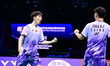 Chinese players Chen Xu Jun and Huang Di compete against Fikri Muhammad Shohibul and Marth...