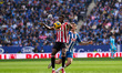 Inaki Williams of Athletic Bilbao battles for the ball with Carlos Romero of RCD Espanyol...