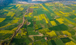 The aerial view shows the blooming mustard farmland on the outskirts of Kathmandu, Nepal,...
