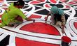 Last minute preparations take place at Central Shaheed Minar on the occasion of Internatio...