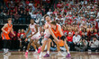 Wisconsin Badgers forward Carter Gilmore #7 blocks the view of Illinois Fighting Illini fo...