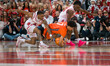 Wisconsin Badgers guard Kamari McGee #4, John Blackwell #25, and Illinois Fighting Illini...