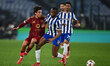 Paulo Dybala of A.S. Roma and Tiago Djalo of F.C. Porto play in the 2024/25 UEFA Europa Le...