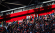 Supporters of AFC Ajax Amsterdam stand in the sun during the match between Ajax and Go Ahe...