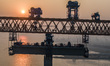 Workers work on the South passage bridge of the Zhangjinggao Yangtze River Bridge in Zhang...