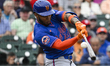 New York Mets outfielder Jose Azocar #30 bats during a Grapefruit League spring training g...