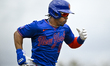 New York Mets shortstop Francisco Lindor #12 runs during a Grapefruit League spring traini...