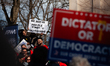 Hundreds of U.S. Postal Service workers rally against Department of Government Efficiency...