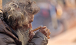 A Sadhu, or Hindu holy man, smokes marijuana on the premises of Pashupatinath Temple in Ka...