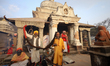 A Sadhu, or Hindu holy man, is pictured on the premises of Pashupatinath Temple on the eve...