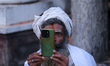 A Sadhu, or Hindu holy man, is pictured on the premises of Pashupatinath Temple on the eve...