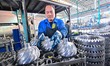 A worker works in a workshop at a gear manufacturing enterprise in Qingzhou Economic Devel...
