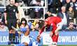 #7, Xavier Simons of Wycombe Wanderers checks on #2, Ethan Laird of Birmingham City, resul...