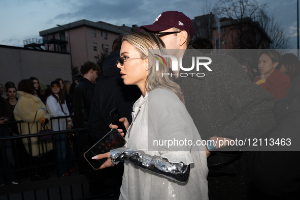 Guests arrive at the Fiorucci show for the autumn/winter 2025-2026 collection in Milan, Italy, on March 1, 2025.  by Antonio Abbruzzese/NurPhoto