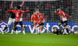 PSV midfielder Jerdy Schouten, Arsenal midfielder Martin Odegaard, and PSV midfielder Isma...