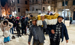 Figurants participate in a procession during the death of the puppet Mba Biose on Shrove T...
