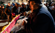 Figurants participate in a procession during the death of the puppet Mba Biose on Shrove T...
