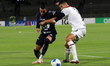 Rogelio Funes Mori #29 of Pumas de la UNAM and Alexis Gamboa #13 of Liga Deportiva Alajuel...