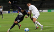 Rogelio Funes Mori #29 of Pumas de la UNAM and Alexis Gamboa #13 of Liga Deportiva Alajuel...