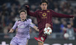 In Rome, Italy, on March 6, 2025, Paulo Dybala of A.S. Roma competes for the ball with Mik...