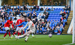 Goalkeeper Jed Steer (31, Peterborough United) is unable to stop Richard Kone (24, Wycombe...