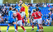 Will Norris (50 Wycombe Wanderers) challenges for the ball during the Sky Bet League 1 mat...