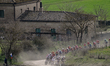 Cyclists face a race during the Strade Bianche Men cycling event in Siena, Italy, on March...