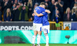 James Tarkowski congratulates Jack Harrison of Everton for his goal during the Premier Lea...
