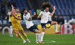 Florian Thauvin of Udinese Calcio, Alessio Romagnoli of S.S. Lazio, and Matteo Guendouzi o...