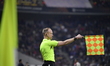 Assistant referee Christian Gittelmann officiates during the Round of 16 first leg Europa...