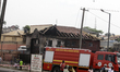 Property is affected by an exploded tanker at Otedola Bridge in Lagos, Nigeria, on March 1...
