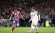 Luka Modric of Real Madrid and Julian Alvarez of Atletico de Madrid are in action during t...